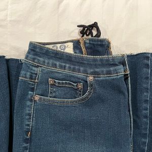 Free People CRVY Super High-Rise Lace-Up Flare. Color Worn Dark.